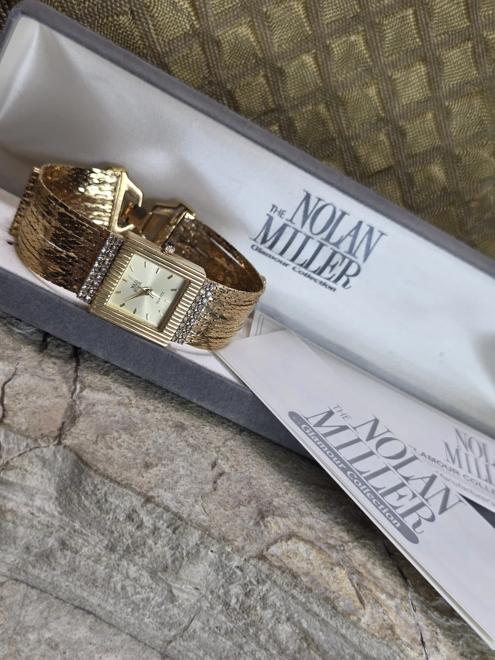 Nolan Miller Gold Chain Bracelet Watch  Rhinestone Accents Blue Sapphire Crown